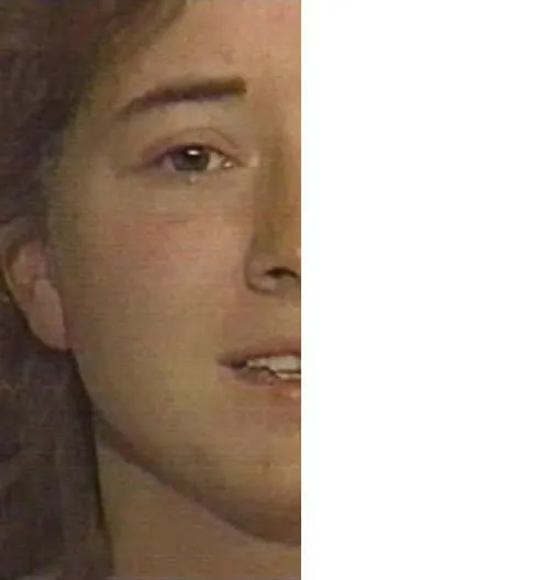 The Mystery of the Mona Lisa Solved Through Nonverbal Communication 3 Left half of the face of a brown-haired woman with a neutral expression
